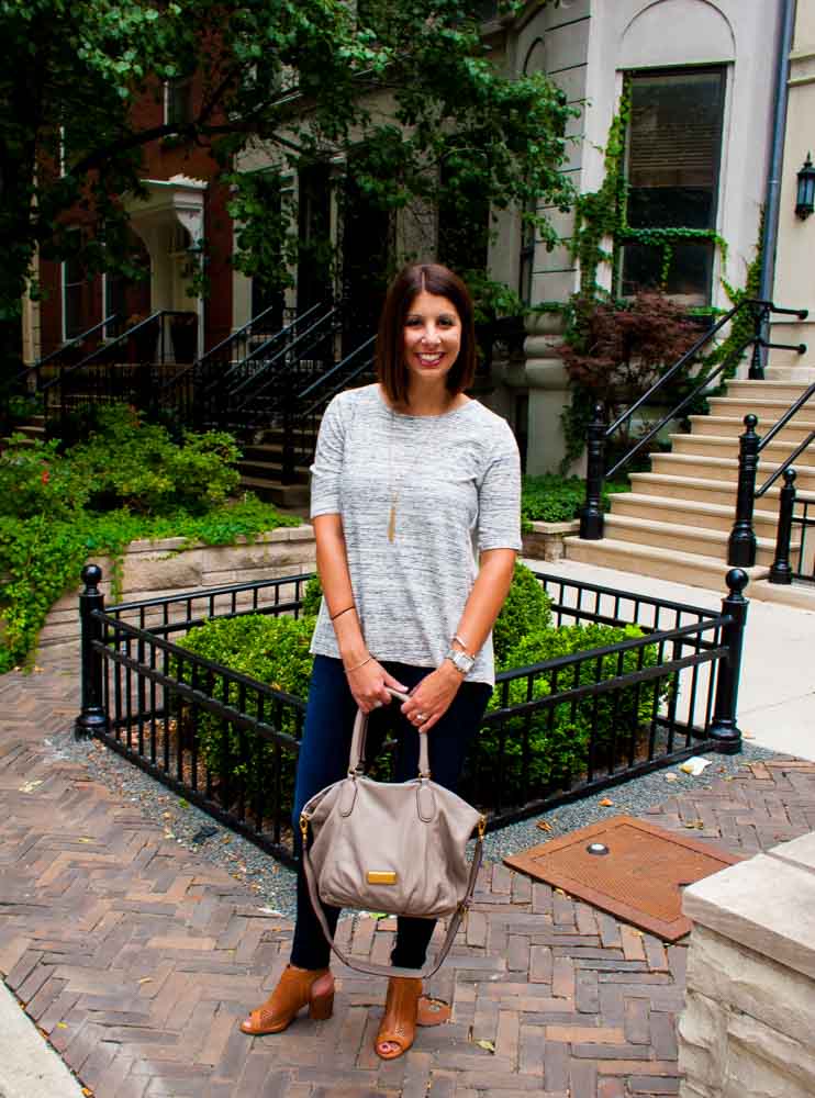 woman wearing grey shirt and jeans for Currently Loving September Edition