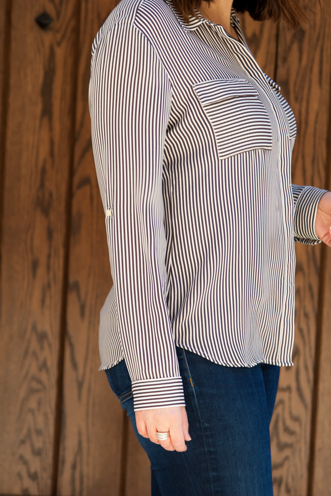 closeup of woman wearing striped utility blouse 