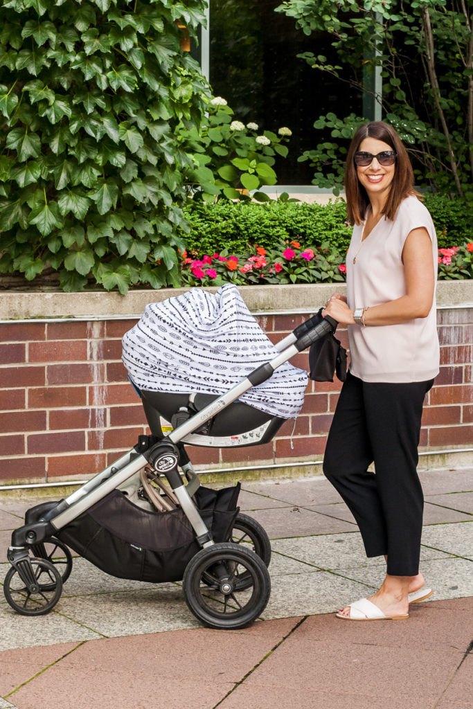 mm lafleur casual the joan top and pushing a baby's stroller