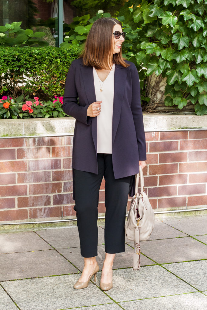 woman wearing blue coat and mm lafleur casual line clothes