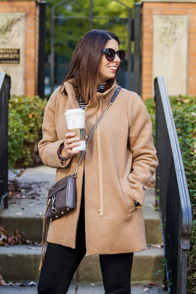 woman getting a coffee and wearing J.Crew Winter Coat: The Cocoon Coat