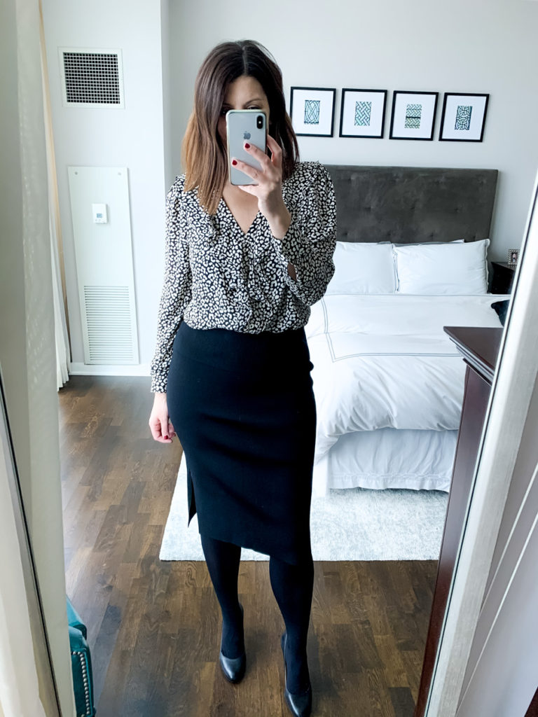 woman wearing black and white leopard print ruffle and skirt which is one of the ways to wear one top 3 ways 