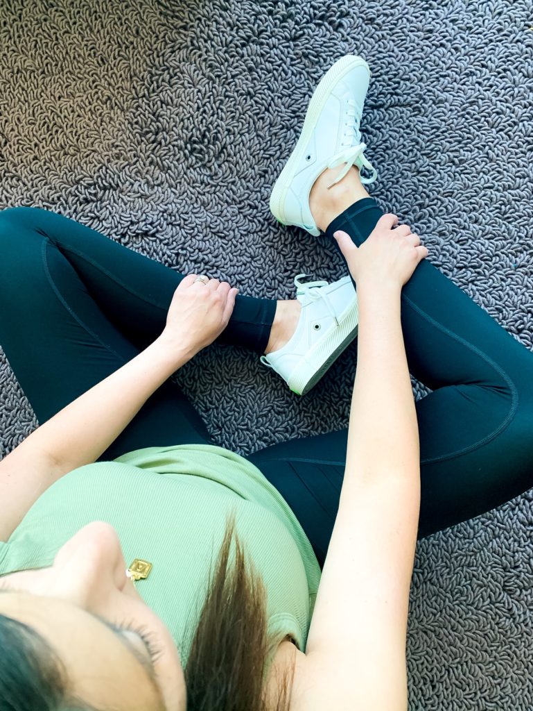 leggings and white sneakers