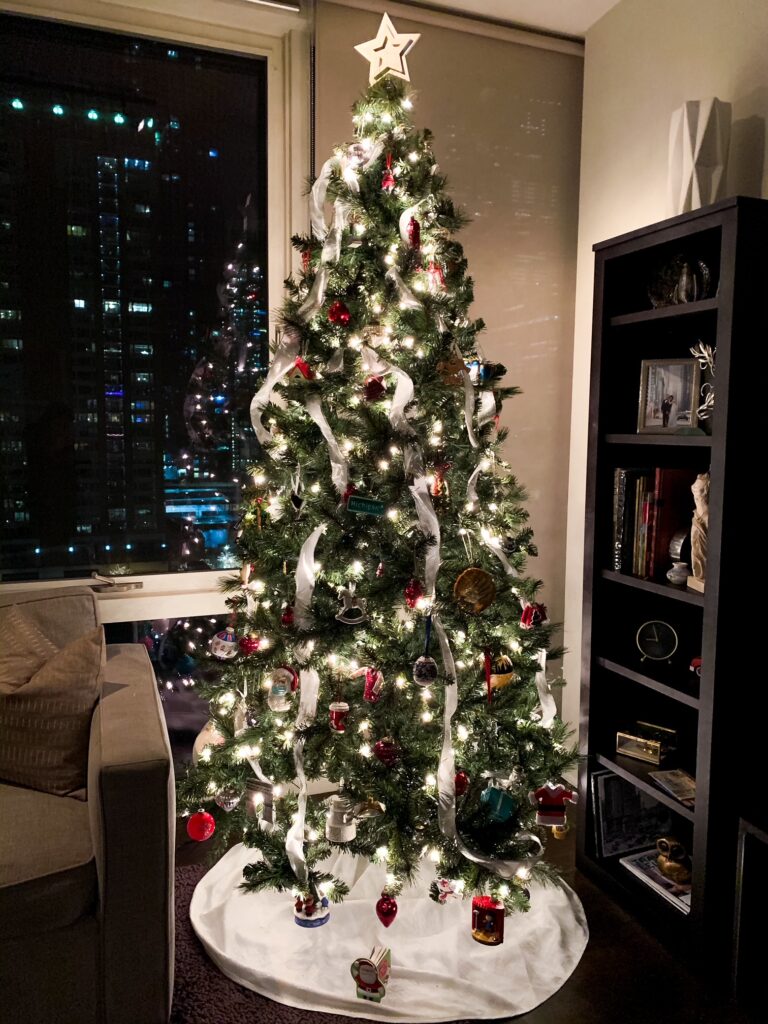 a faux tree with family ornaments