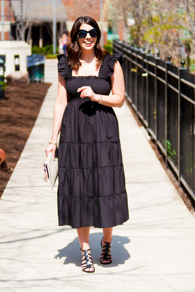woman smiling wearing black dress Nap Dress Review