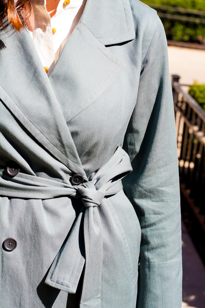 closeup detail image of a unique trench coat