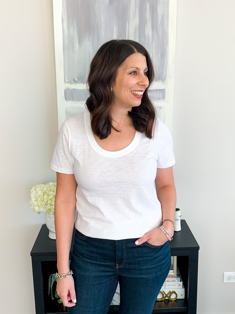 woman wearing jeans and best white t shirt from J.Crew Vintage Scoop Neck  