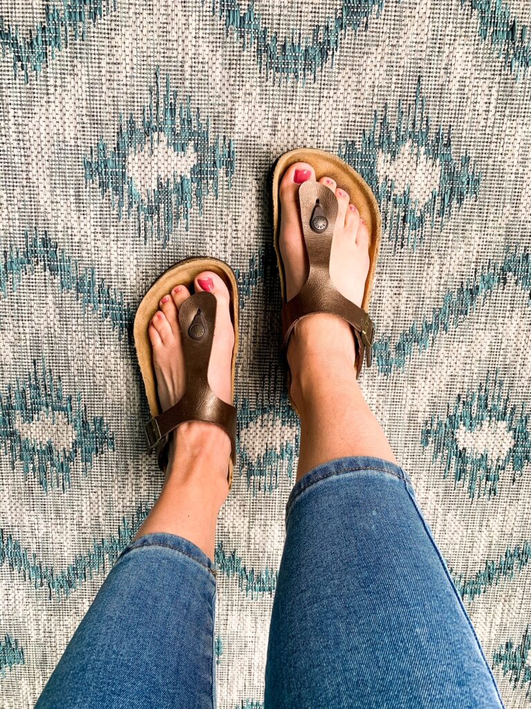 woman wearing a pair of birkenstock sandals