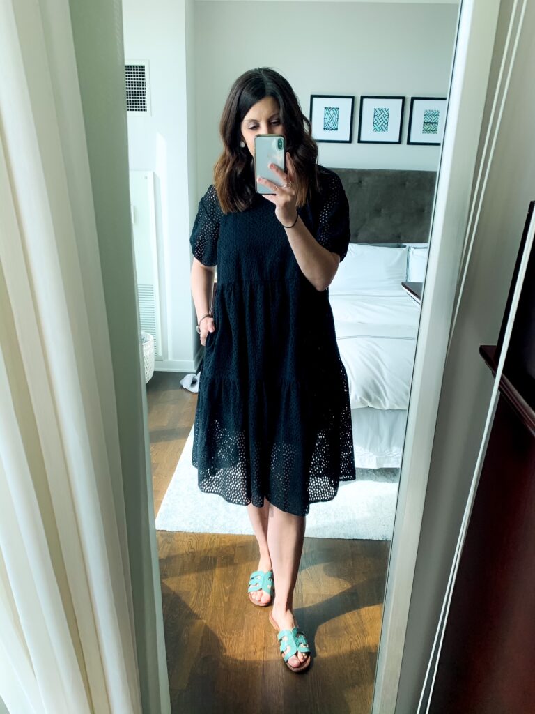 woman wearing Tiered Eyelet Dress from everlane summer sale