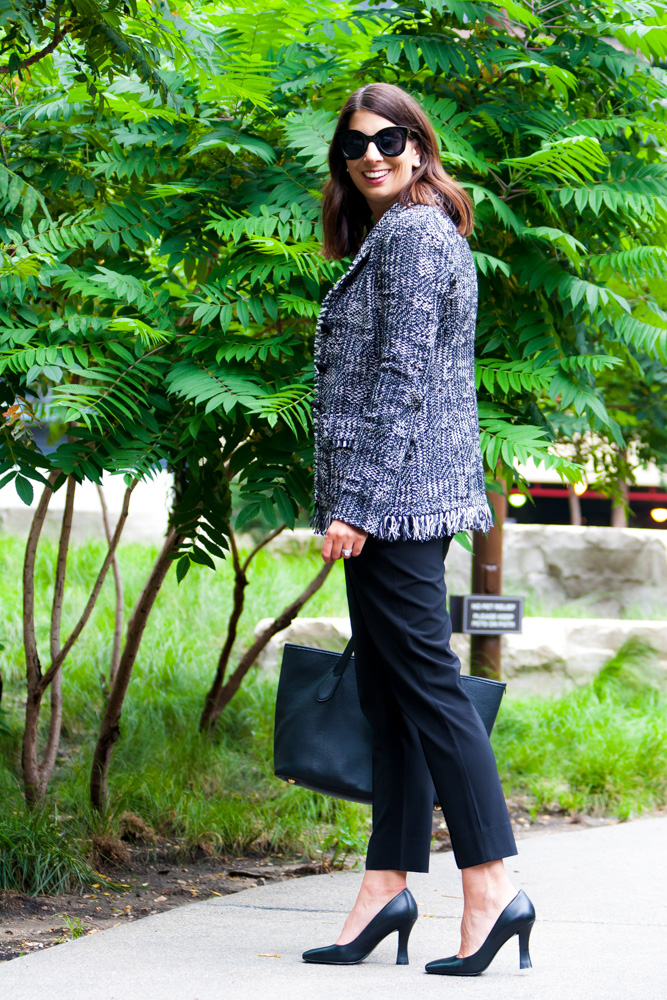 woman wearing blazer and black pants
