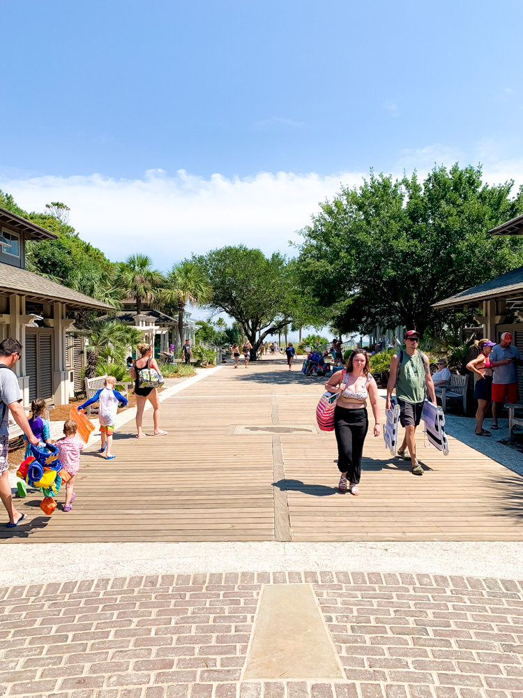 people walking at the pathway in coligny beach 