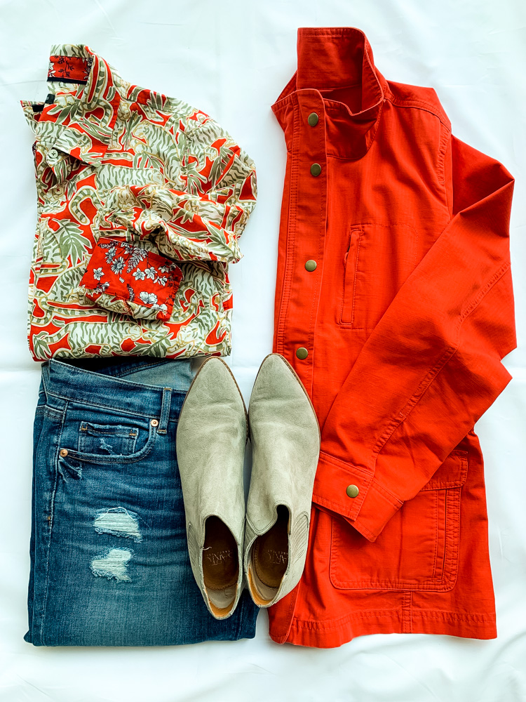 pants, printed top, and red jacket