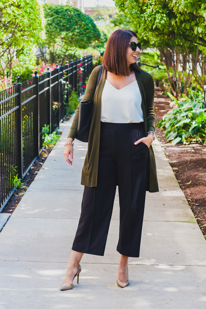 woman wearing Wide Leg Pants, white top, and long cardigan 