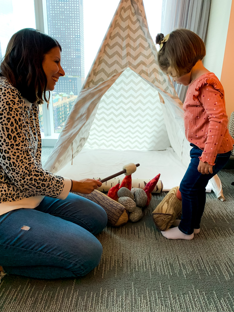 mother and child playing in a room at Loews Chicago Hotel