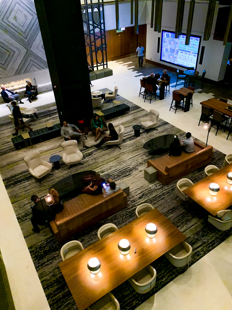 the lobby with people at the loews chicago hotel