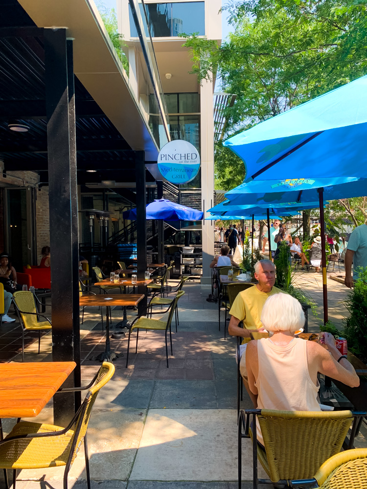 outdoor dining on ogden slip at the Pinched on the River