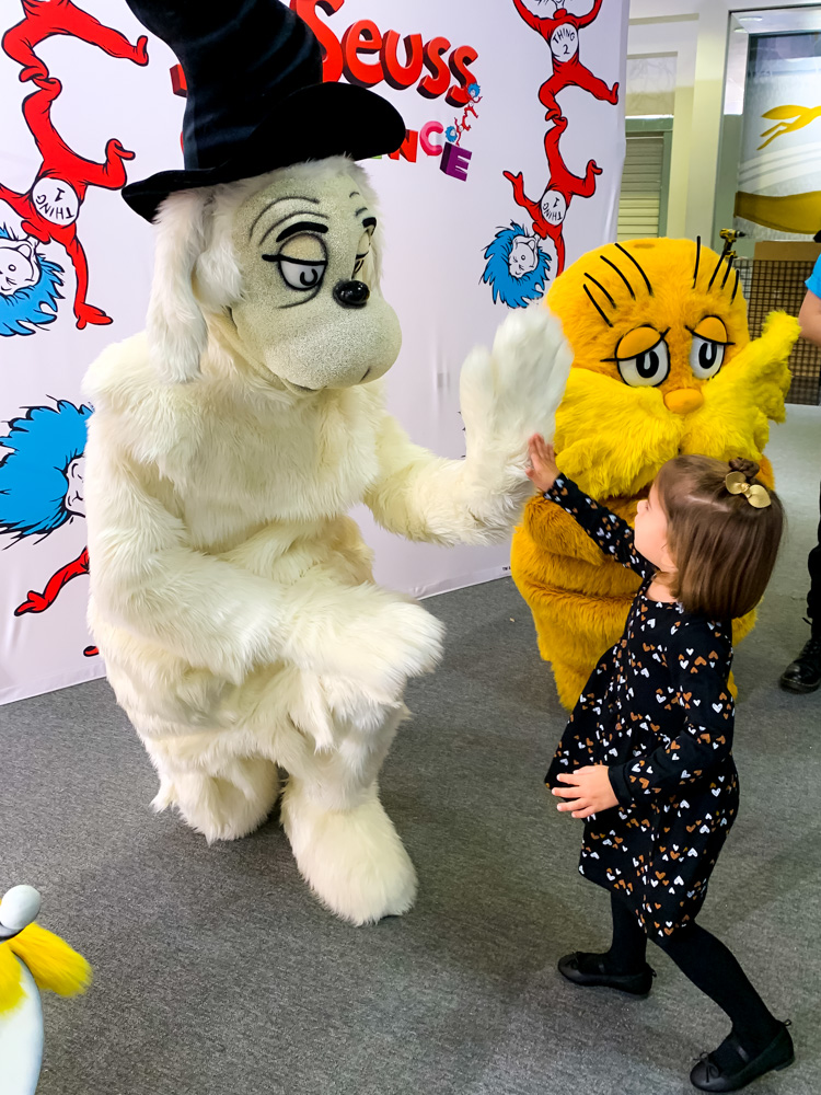 giving high fives at the dr. seuss experience