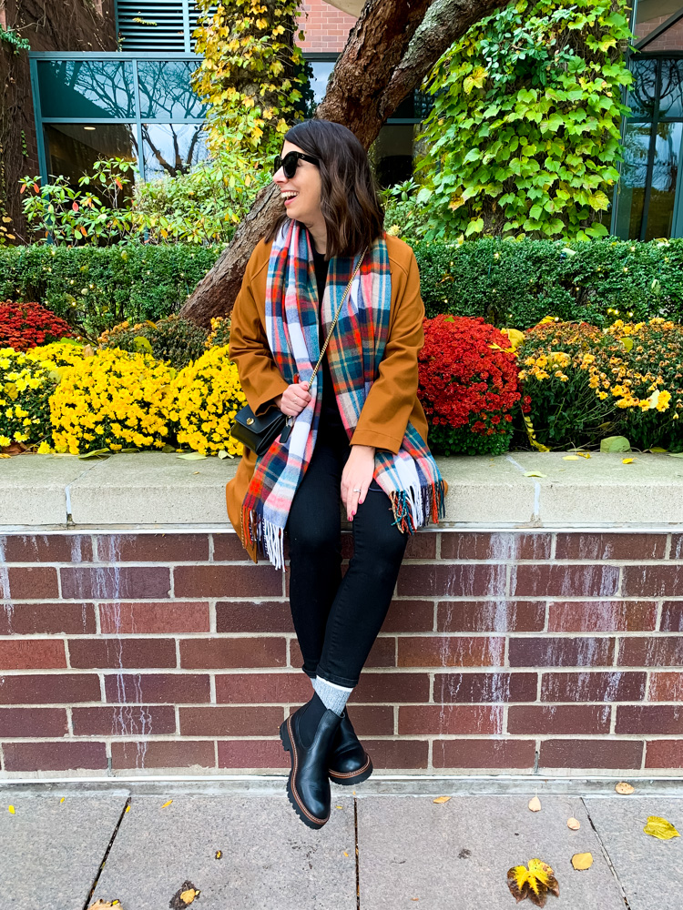 woman sharing how to style chelsea boots