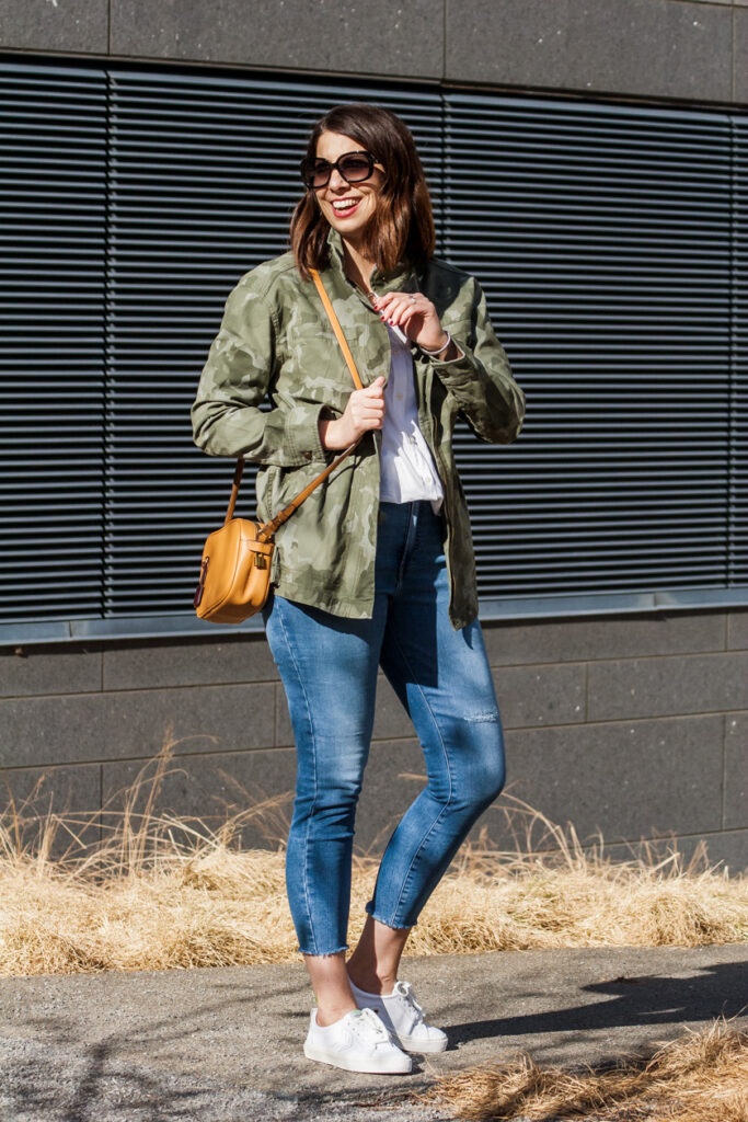 woman wearing a green spring jacket