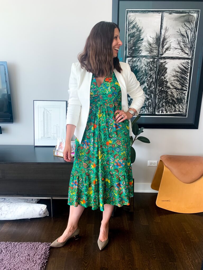 woman smiling and wearing a green pattern dress with a White Blazer For Work