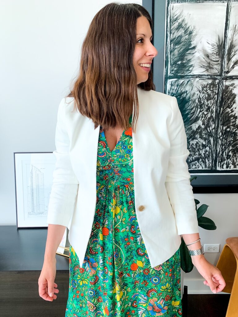 woman wearing a green pattern dress with a White Blazer For Work