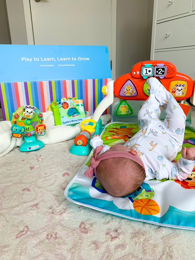 baby playing with toys from Vtech toys