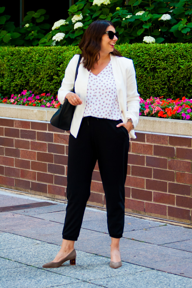 woman showing how to wear joggers to the office