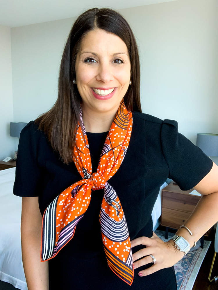 woman wearing orange scarf