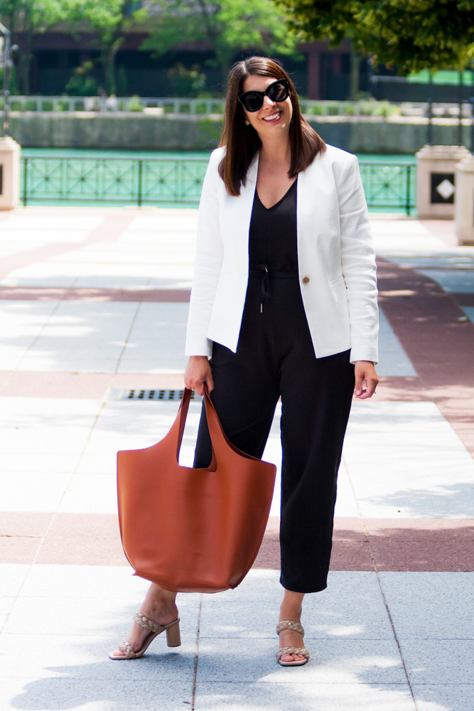 woman standing with work tote under $300