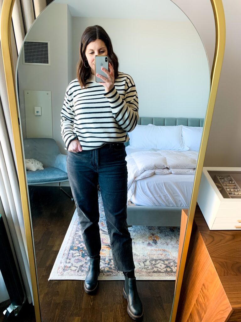 woman taking selfie of her straight leg jeans outfits