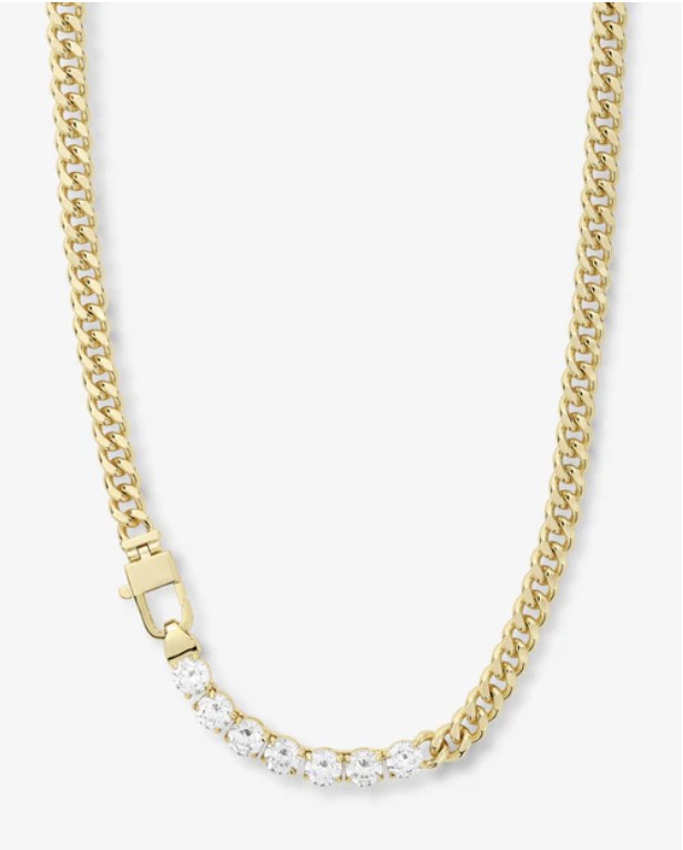 Crystal statement necklace styled with a fall dress and boots