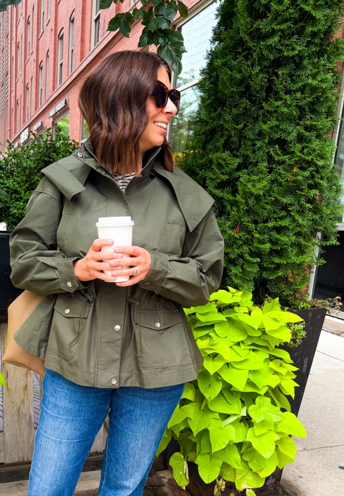 woman over 40 wearing a funnel neck jacket for fall